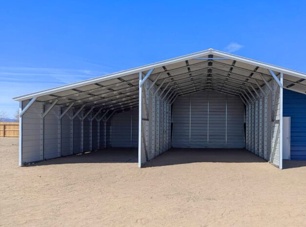 Spacious run-in barn with a blue accent wall and open design, ideal for Arlington Heights IL horse care.