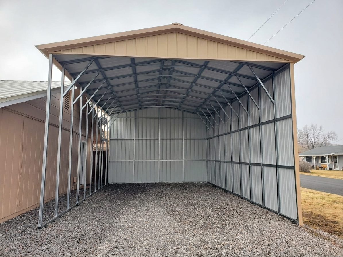 A-frame carport structure with a metal frame and gravel flooring, showcasing building details for Carrollton TX.