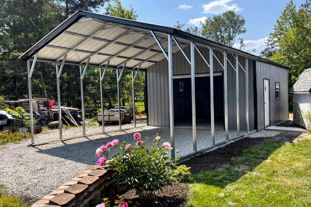 Custom RV carport with a metal structure and open sides, surrounded by landscaping in Balch Springs, TX.
