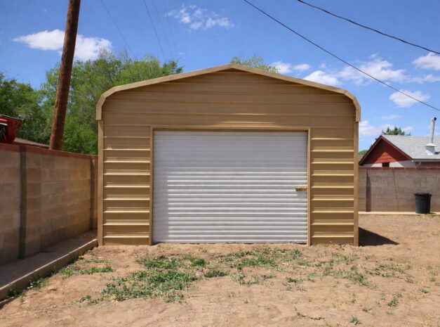 A tan mini shed with a roll-up door, set against a clear blue sky in Beeville, TX.