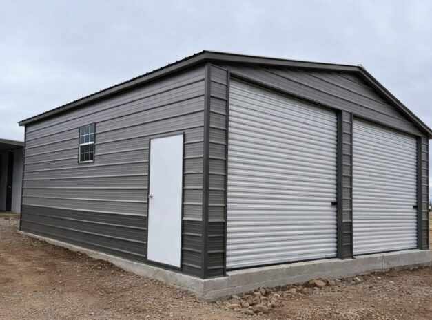 Standard garage structure in Big Rapids, MI, featuring metal siding and roll-up doors.