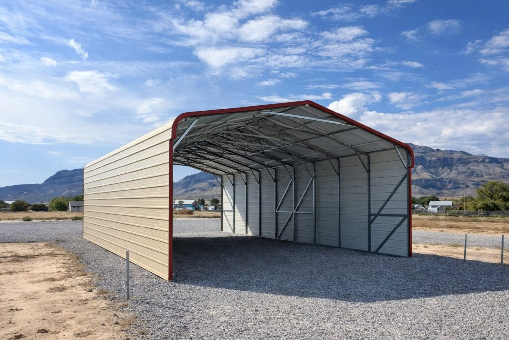 A spacious standard carport with a metal frame and a red roof, set against a clear blue sky in Eau Claire, WI.