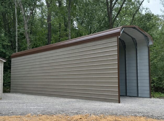 Standard framed carport in Flagstaff AZ, showcasing a spacious design with a brown and gray color scheme.
