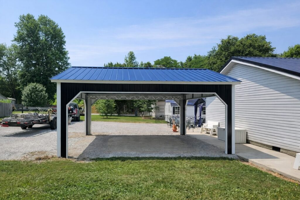 A black and white A-framed carport with a blue metal roof, set in a grassy area near homes in Flint, MI.