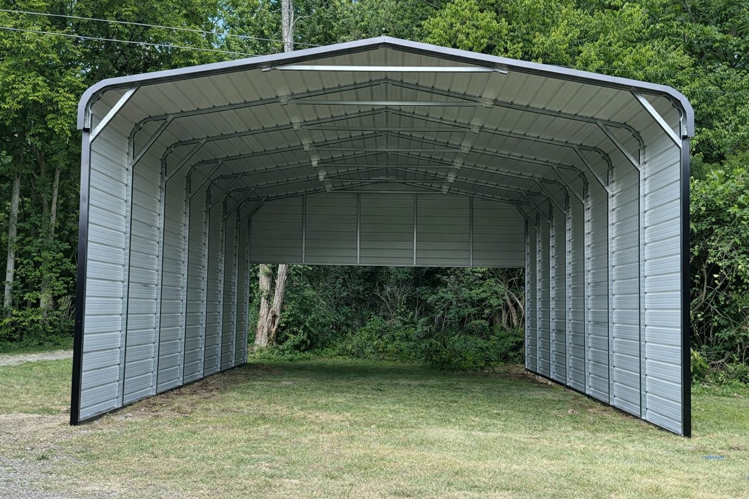 A spacious A-framed carport in Georgetown, KY, showcasing its open design and sturdy metal structure.
