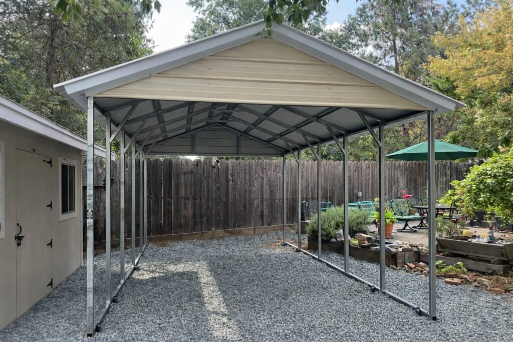 A-frame carport with a metal frame and roof, set in a gravel area surrounded by greenery in Grand Prairie, TX.