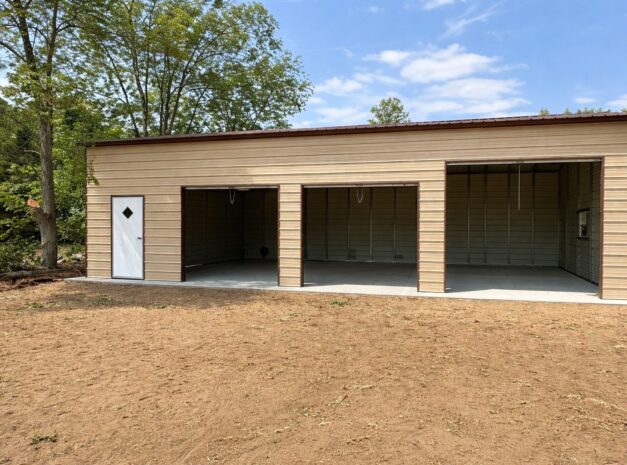 Expansive garage structure in Lampasas TX with a wooden exterior and open bays, ready for customization.