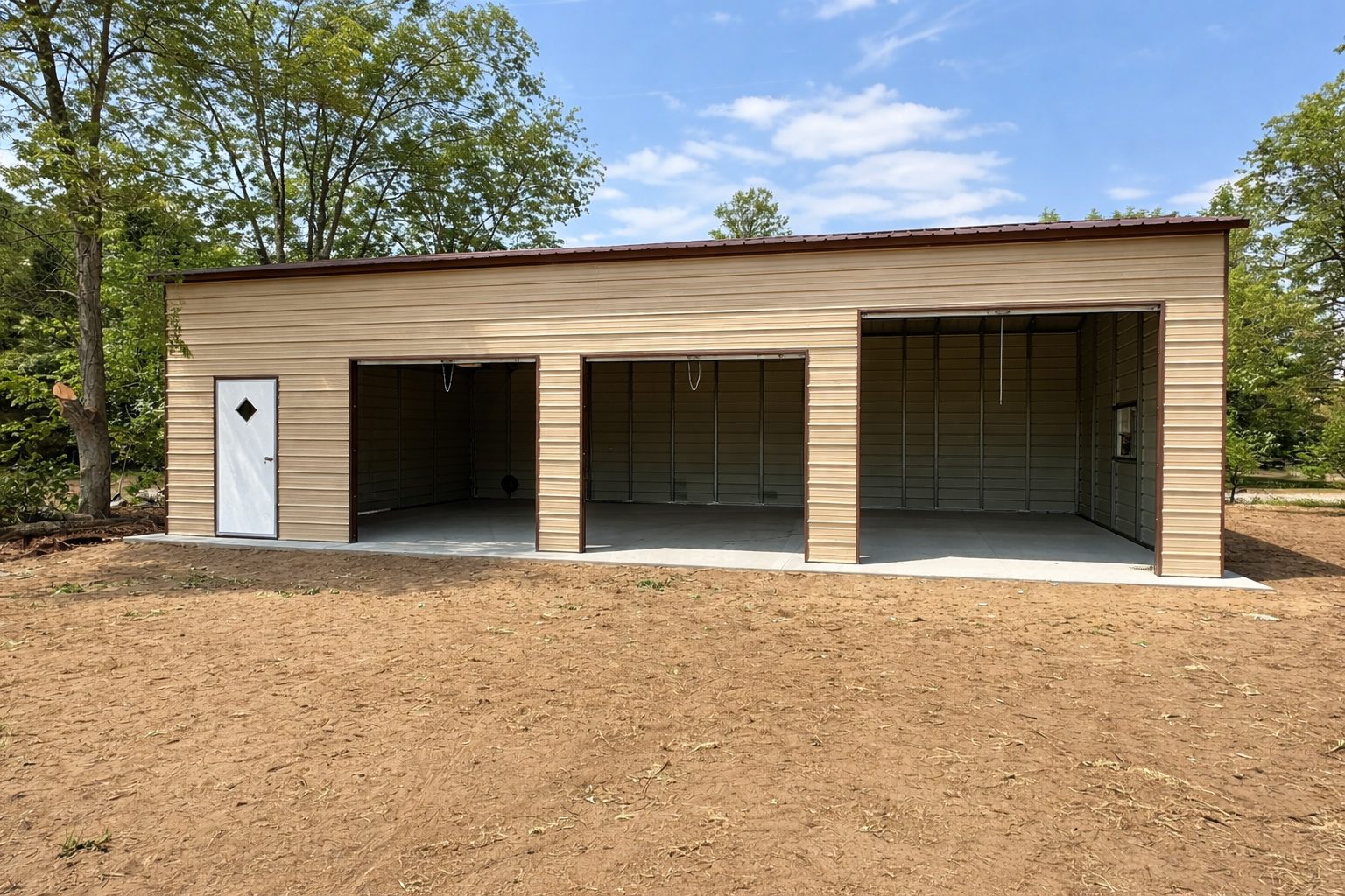 Expansive garage structure in Lampasas TX with a wooden exterior and open bays, ready for customization.