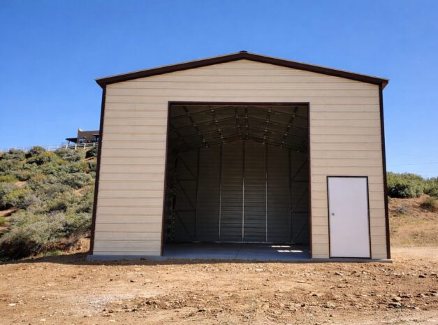 A-frame carport with a large open entrance, showcasing its spacious interior and metal construction.