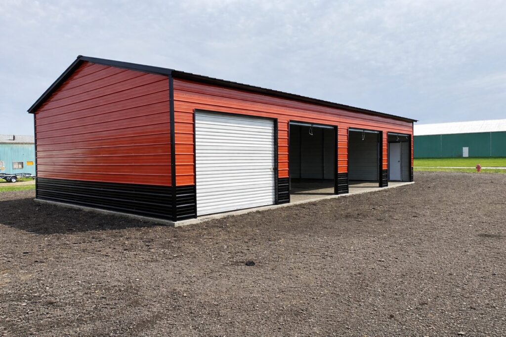 Expansive garage in Mason City, IA, featuring a vibrant red and black exterior with multiple storage bays.