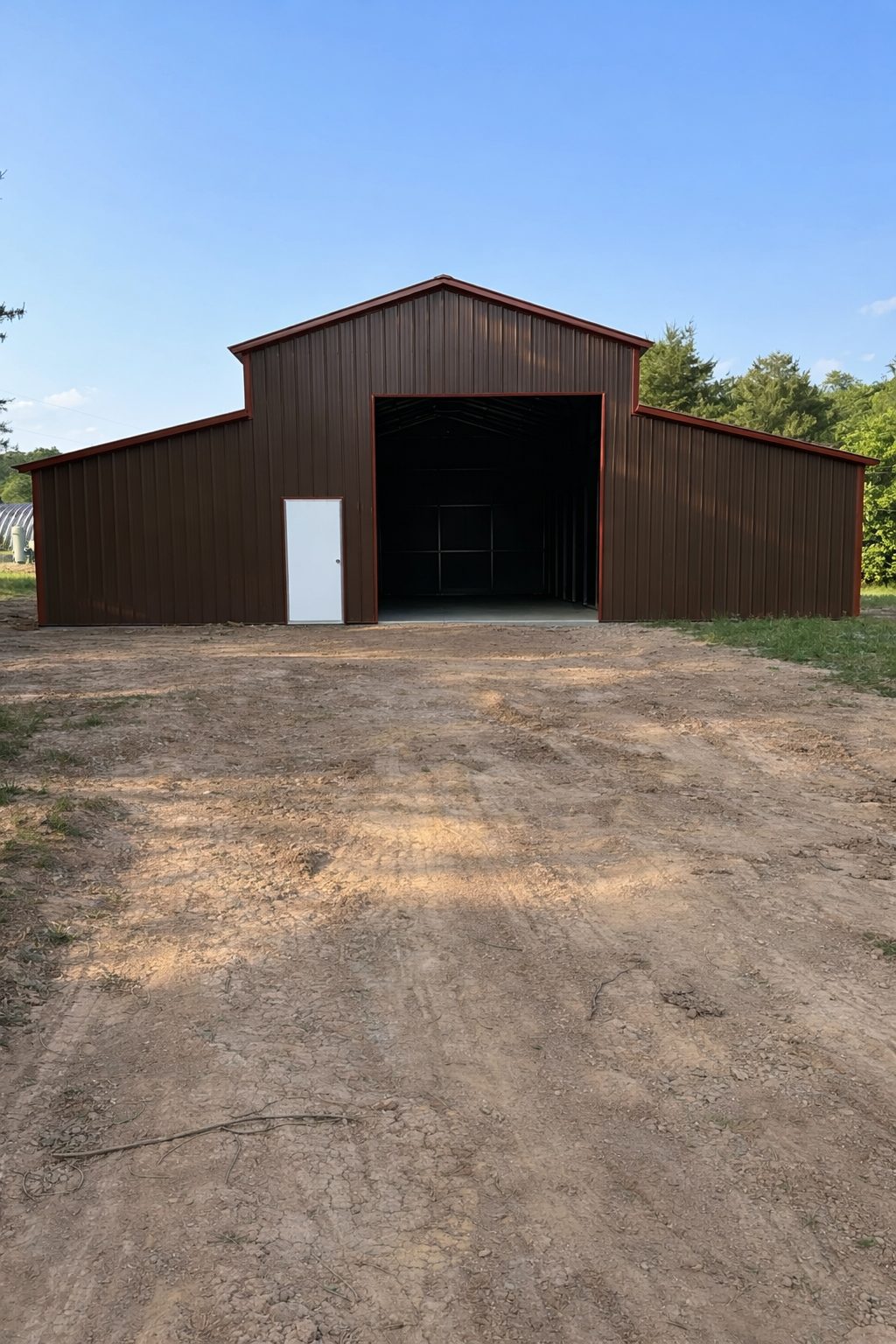 Traditional barn structure in Newark, OH, featuring a brown exterior and large open entrance.