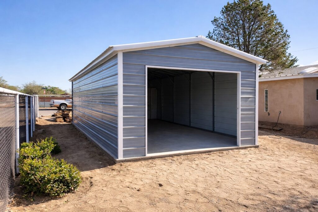A gray mini shed with an open front, showcasing the interior space, located in San Augustine, TX.