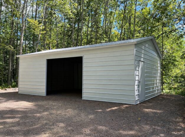 Standard shed in Sanger, TX, featuring a metal exterior and surrounded by trees.